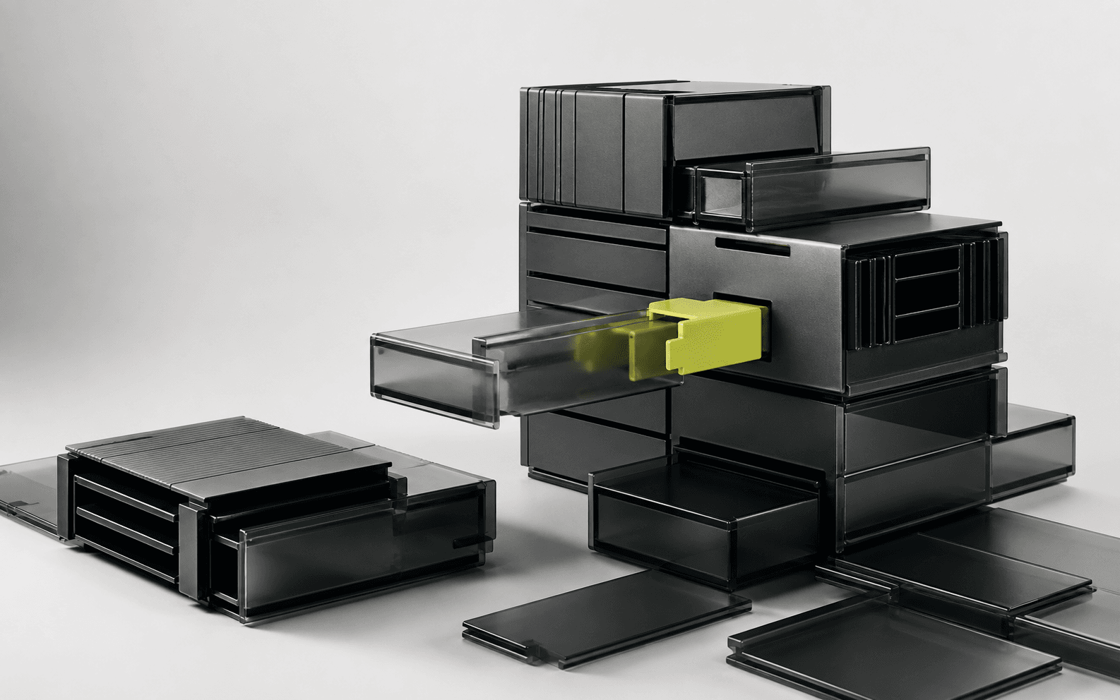 Interlocking black modules with one green connector