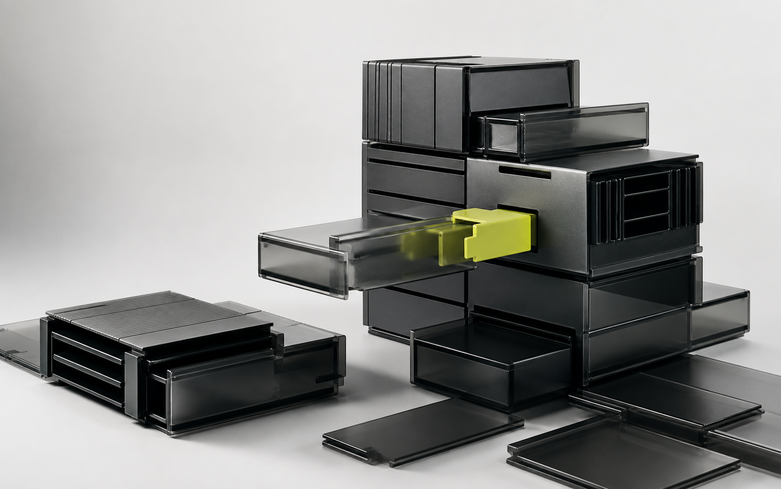 Interlocking black modules with one green connector